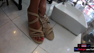 Pedicure for the Asian teen girlfriend and a footjob by her afterwards