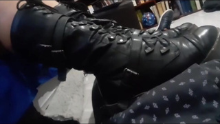 New girl in boots talking to slave & her feet on cock