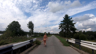 Naked girl on the bridge
