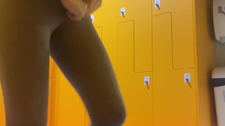 Changing clothes in a public locker room at a gym