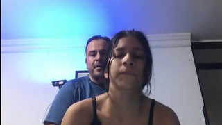 The tenant is fucked in a doggy position without her husband noticing.