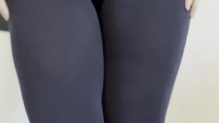 foot Goddess caresses her beautiful thighs and ass in tight leggins