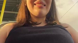 Asian Girl in Pink Jacket Teasing on Public Transport