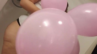 Wet BBW playing with balloons