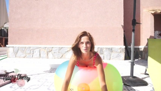 I inflate a giant beach ball and play with it - Claary Cherry