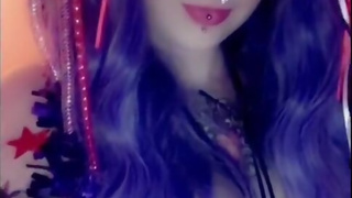 Sexy scene girl shoves glow stick in pussy