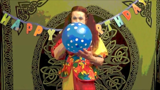 Creepy Clown Inflating and Playing With Balloons