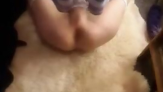 Sissy Faggot fucks herself with a big black dildo