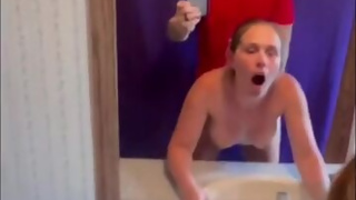 Slutty gets fucked in front of mirror