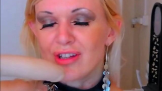 Mature blonde takes a baseball-bat in her asshole