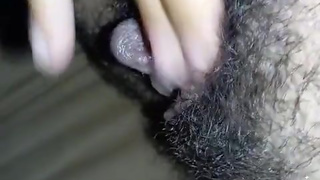 Lesbian masturbates female orgasm close up