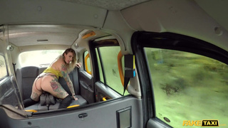 Fake Taxi Ava Austen rides a big black dildo on the backseat